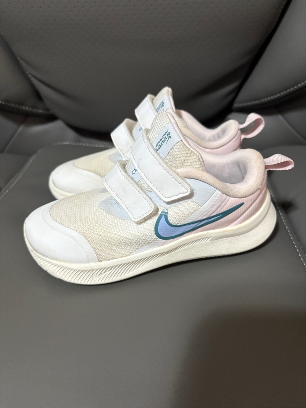 Nike Kids White Sneakers with Pink Trim and Teal Swoosh